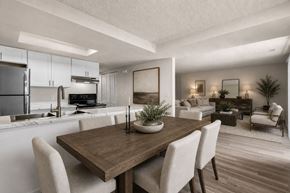Midvale apartment for rent - A modern kitchen with a dining table and chairs.