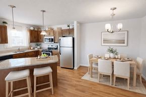St Cloud apartment for rent - A kitchen with a table set for four.