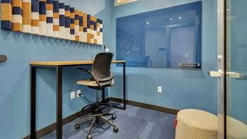 Study nook with high top desk and ergonomic chair