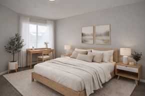 St Cloud apartment for rent - A bedroom with a large bed and two nightstands.