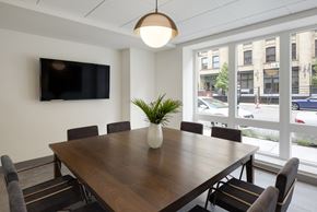 Minneapolis apartment for rent - A conference room with a large table and chairs.