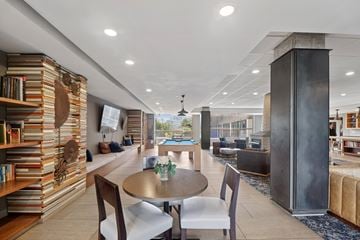 Philadelphia apartment for rent - A modern living room with a dining table and chairs.