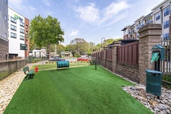 Pet park with benches and agility course