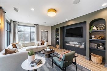 A living room with a couch and a tv