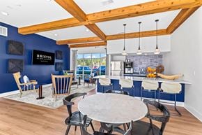 Bluffton apartment for rent - A dining room with a round table and chairs.