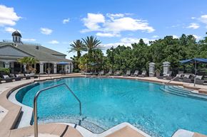 Tampa apartment for rent - Community pool with lounge seating