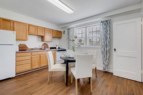 Baltimore apartment for rent - Kitchen with hardwood flooring and window  at Cross Country Manor Apartments, Baltimore
