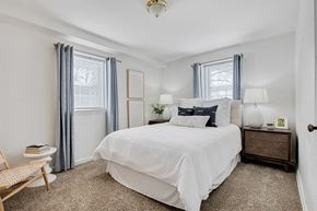 Baltimore apartment for rent - Bedroom with two windows at Cross Country Manor Apartments, Baltimore, 21215