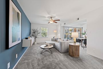 Towson apartment for rent - a living room with a couch and a ceiling fan