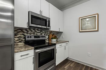 Granite countertops & trinity tile mosaic backsplash