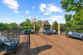 Owings Mills apartment for rent - spacious deck with furniture and privacy fence at McDonogh Township Apartments, Owings Mills