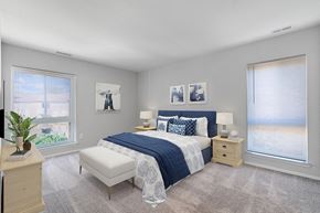 Annapolis apartment for rent - a bedroom with a bed and two windows at Westwinds Apartments, Annapolis, MD