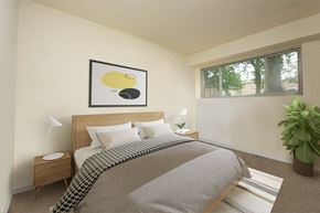 Towson apartment for rent - Bedroom with large windows at Cardiff Hall Apartments, Towson