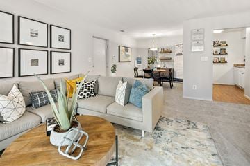Owings Mills apartment for rent - a living room with a couch and a table