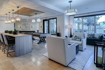 Resident lounge seating areas and large windows 