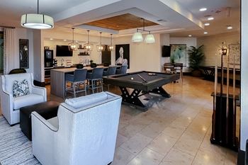 Resident lounge with comfortable chair seating 1