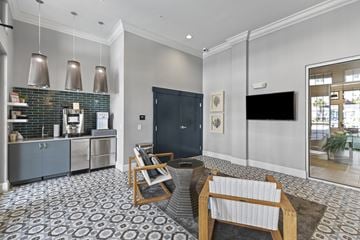 Daniel Island apartment for rent - a living room with a kitchen and a table and chairs