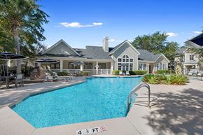 Mount Pleasant apartment for rent - a swimming pool with a house in the background at Sweetgrass Landing, South Carolina, 29466