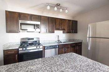 Gourmet kitchen with breakfast bar and pantry