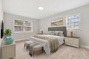 Parkville apartment for rent - a bedroom with a bed and two windows Kenilworth at Perring Park Apartments, Parkville, MD 21234