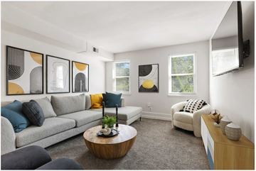 Towson apartment for rent - a living room with a couch and a table