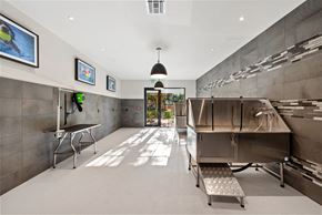 Miami Lakes townhouse for rent - a large kitchen with a large stainless steel refrigerator and a grill