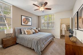 Miami Lakes apartment for rent - a bedroom with a bed and a ceiling fan