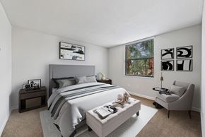 Miami Lakes apartment for rent - a bedroom with a bed and a chair and a window
