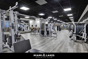 Miami Lakes apartment for rent - A gym with a variety of equipment inside the Miami Lakes Athletic Club.