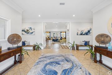 Brunswick apartment for rent - A large, open living room with a blue and white rug in the center.