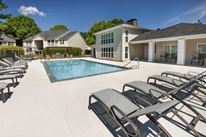 Perry apartment for rent - our apartments have a large pool and lounge chairs