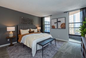 Arlington apartment for rent - a bedroom with a large bed and a window