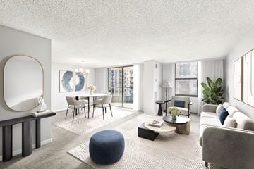 Arlington apartment for rent - A modern living room with a dining table and chairs.