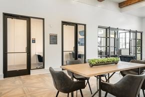 New Braunfels townhouse for rent - a dining room with a table and chairs and glass doors