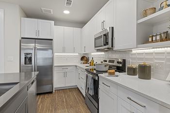 Granite countertops with tile backsplash