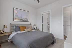 San Antonio apartment for rent - a bedroom with a bed and a door to a bathroom
