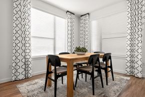 Goodyear apartment for rent - A dining room with a table and chairs.