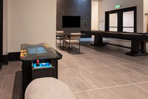 Denver apartment for rent - A room with a pool table and a TV.