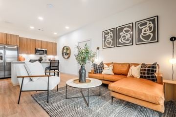 Littleton apartment for rent - A living room with a white sofa and a coffee table.