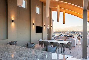 Outdoor grill with intimate seating area