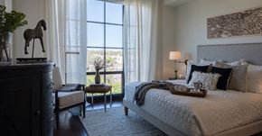 San Antonio apartment for rent - a bedroom with a bed and a dresser and a window
