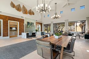San Antonio apartment for rent - a dining room with a wooden table and chairs