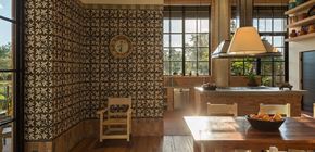 San Antonio apartment for rent - a kitchen with a table and chairs and a large window