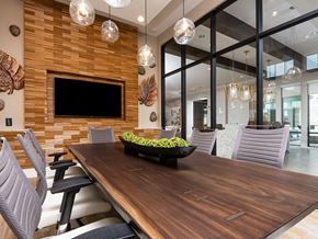 Littleton apartment for rent - a dining room with a wooden table with a bowl of fruit on it