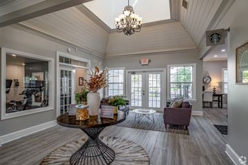 Westlake apartment for rent - the view of a living room with a table and chairs