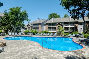 Westlake apartment for rent - a large swimming pool in front of an apartment building