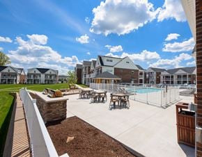 Uniontown apartment for rent - our apartments have an outdoor pool with tables and chairs