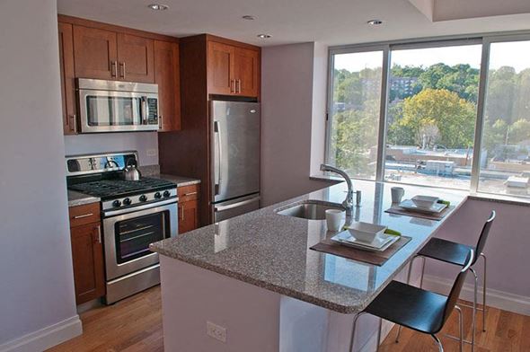 Bronx apartment for rent - a kitchen with a counter top and a sink