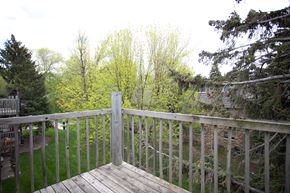 Sioux Falls apartment for rent - a deck with a view of a garden and trees