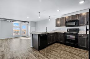 Box Elder apartment for rent - Kitchen overlooking into Living Room